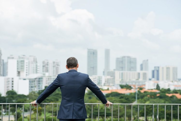 Businessman enjoying cityview